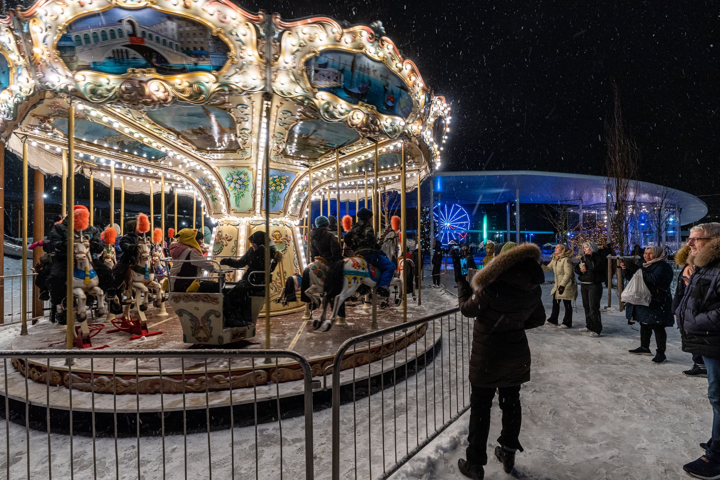 winter fair and christmas fair. Ferris wheel, carousel, sales stalls etc.