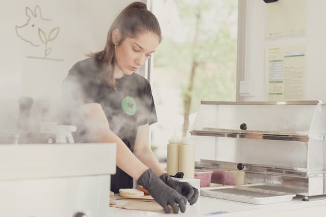 People on the food festival Gladmat in Stavanger either serving food or guests eating food