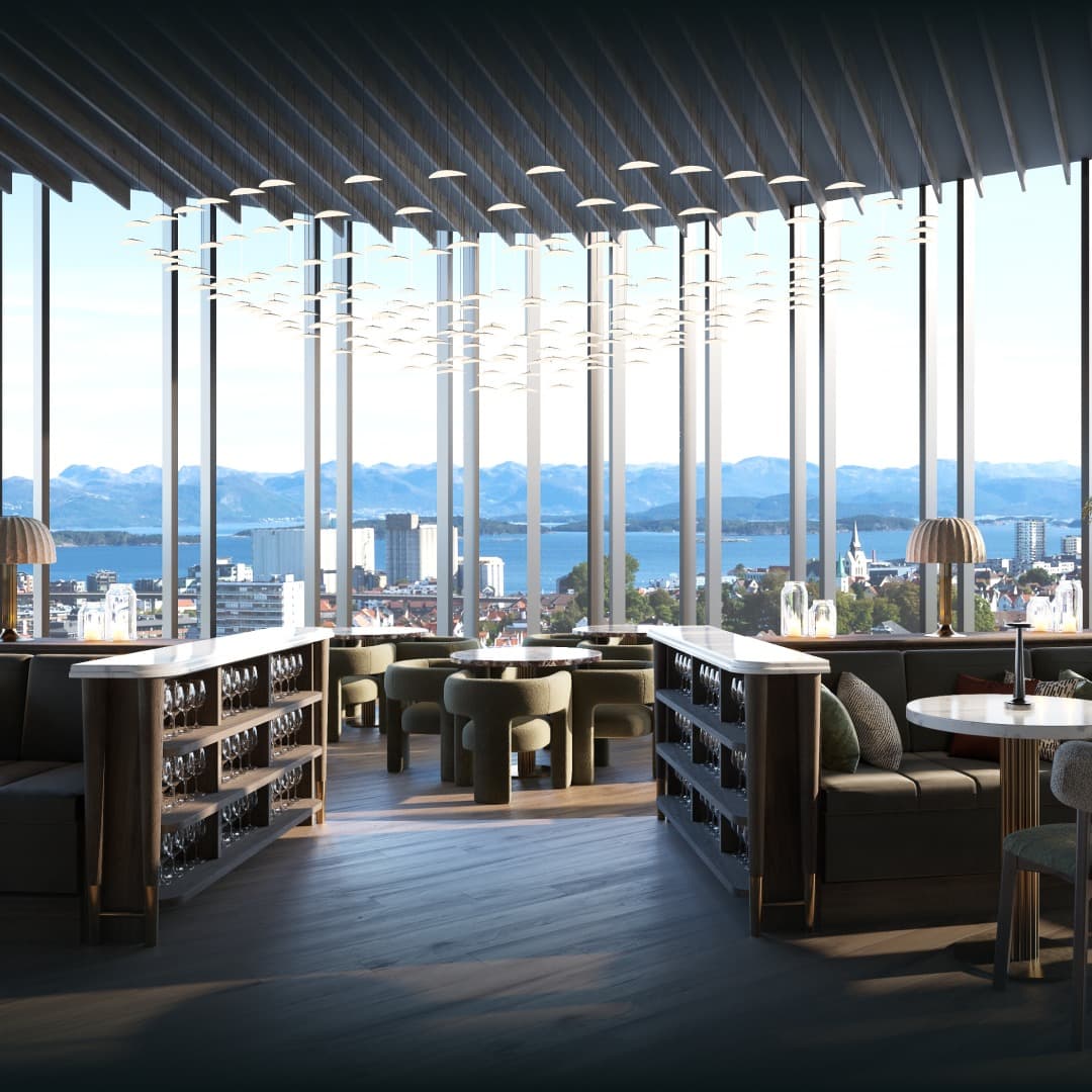 The interior of a restaurant, Seid Restaurant, on the top floor of a 16 storey building. A view of the mountains and city from large, floor to ceiling windows