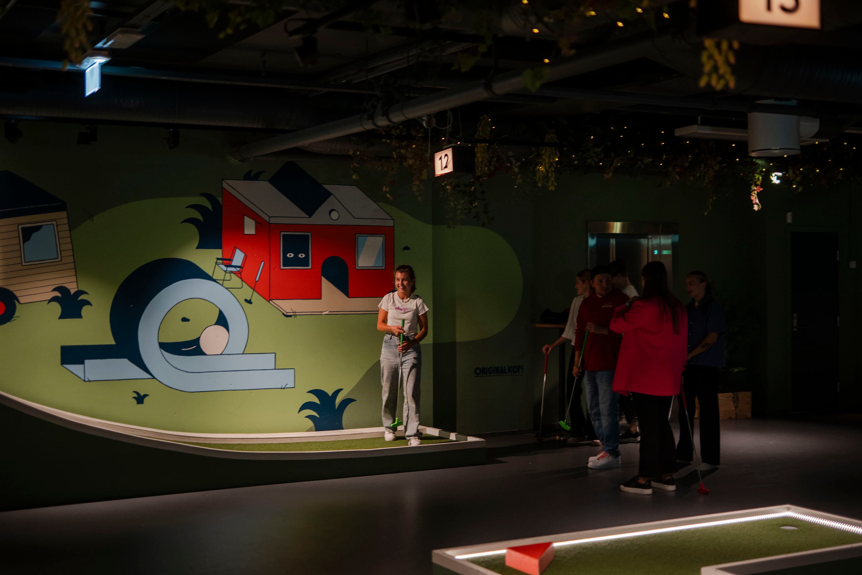 People in the Stavanger Camping Minigolf and Bar playing and having fun