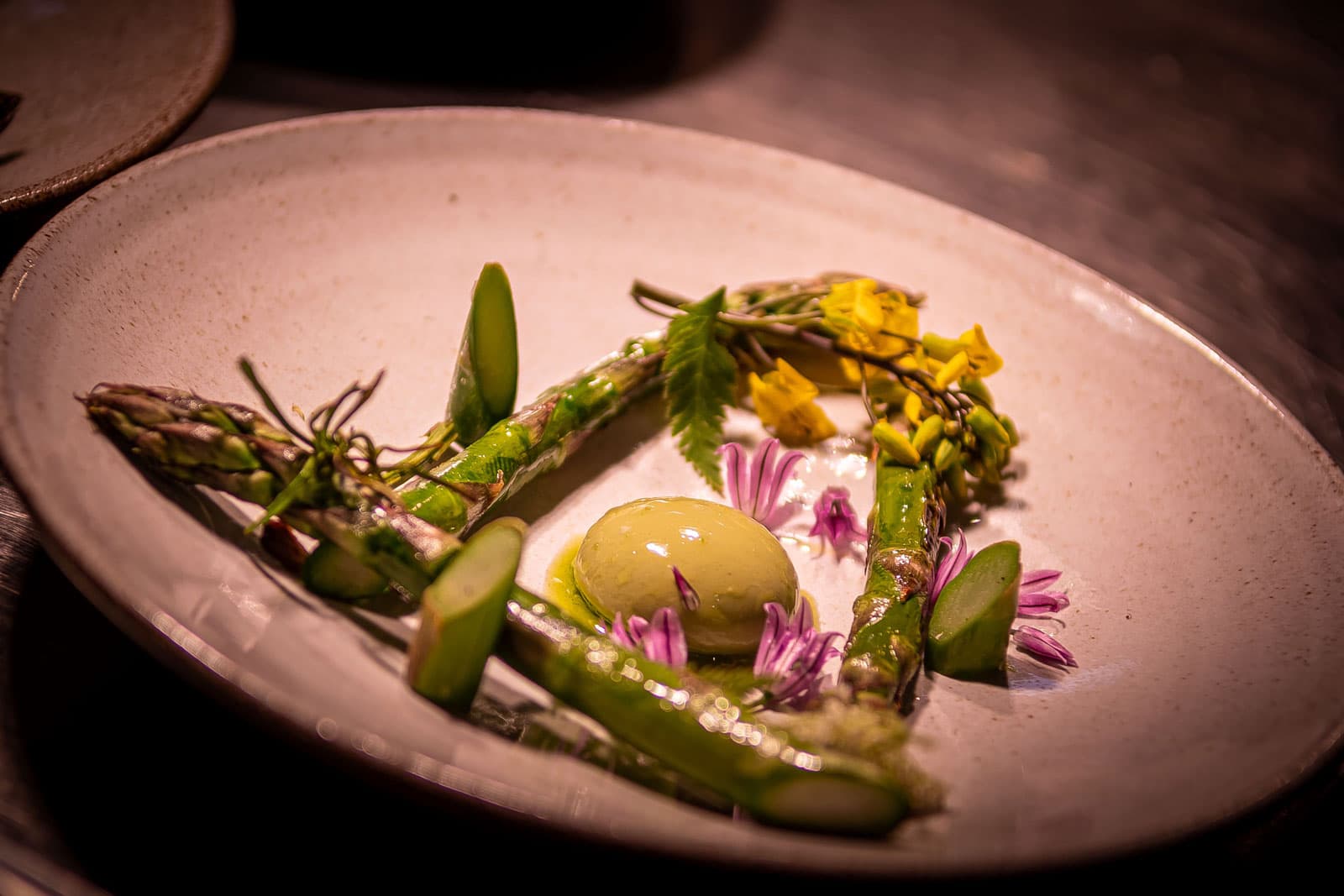 Food and people eating at restaurant Bellies - vegan restaurant