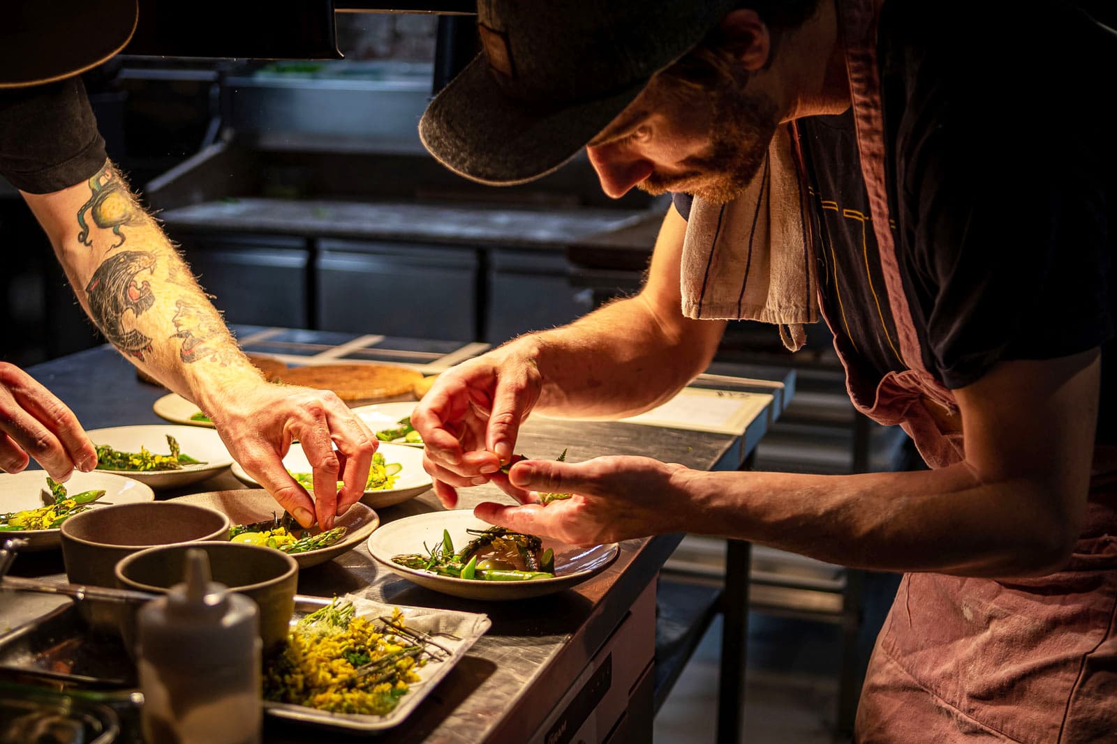 Food and people eating at restaurant Bellies - vegan restaurant