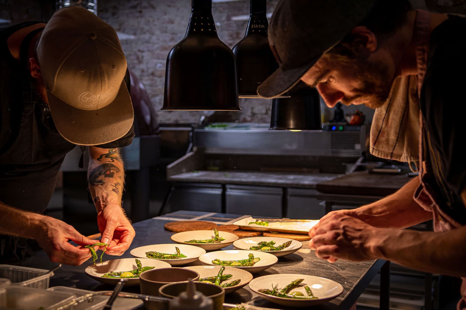 Food and people eating at restaurant Bellies - vegan restaurant