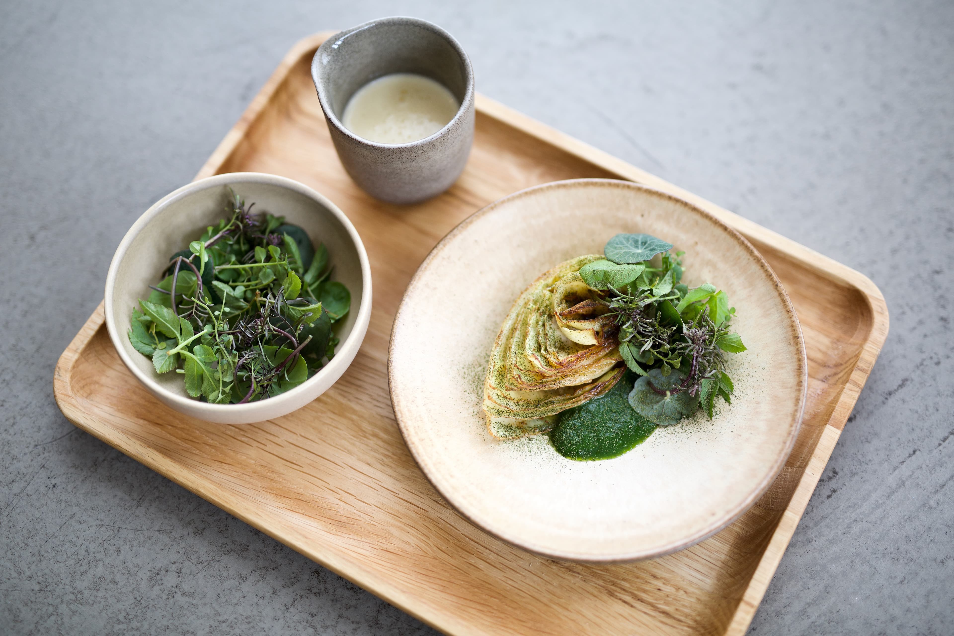 food and people eating and staff at restaurant K2