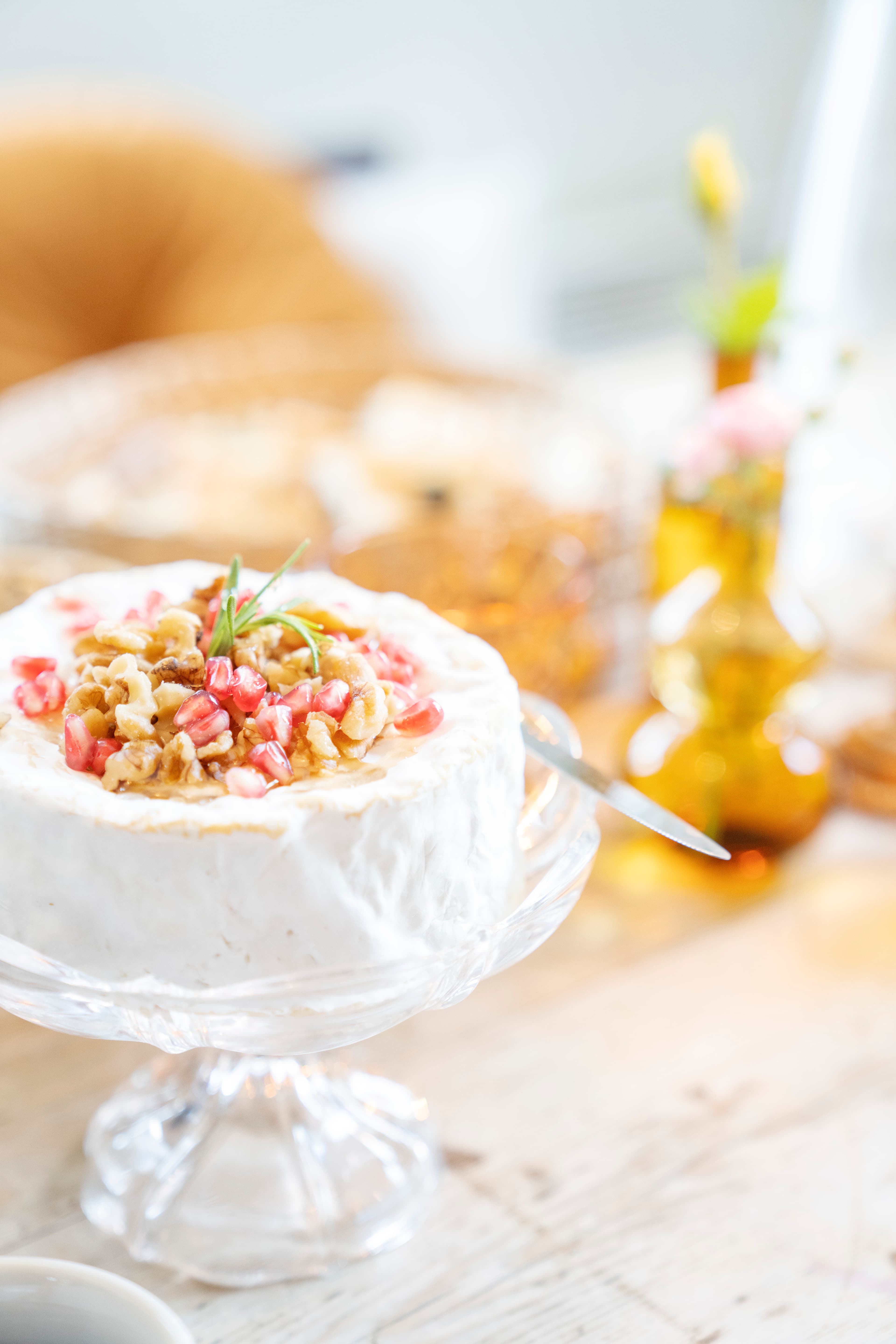 Cheese with pomegranate seeds