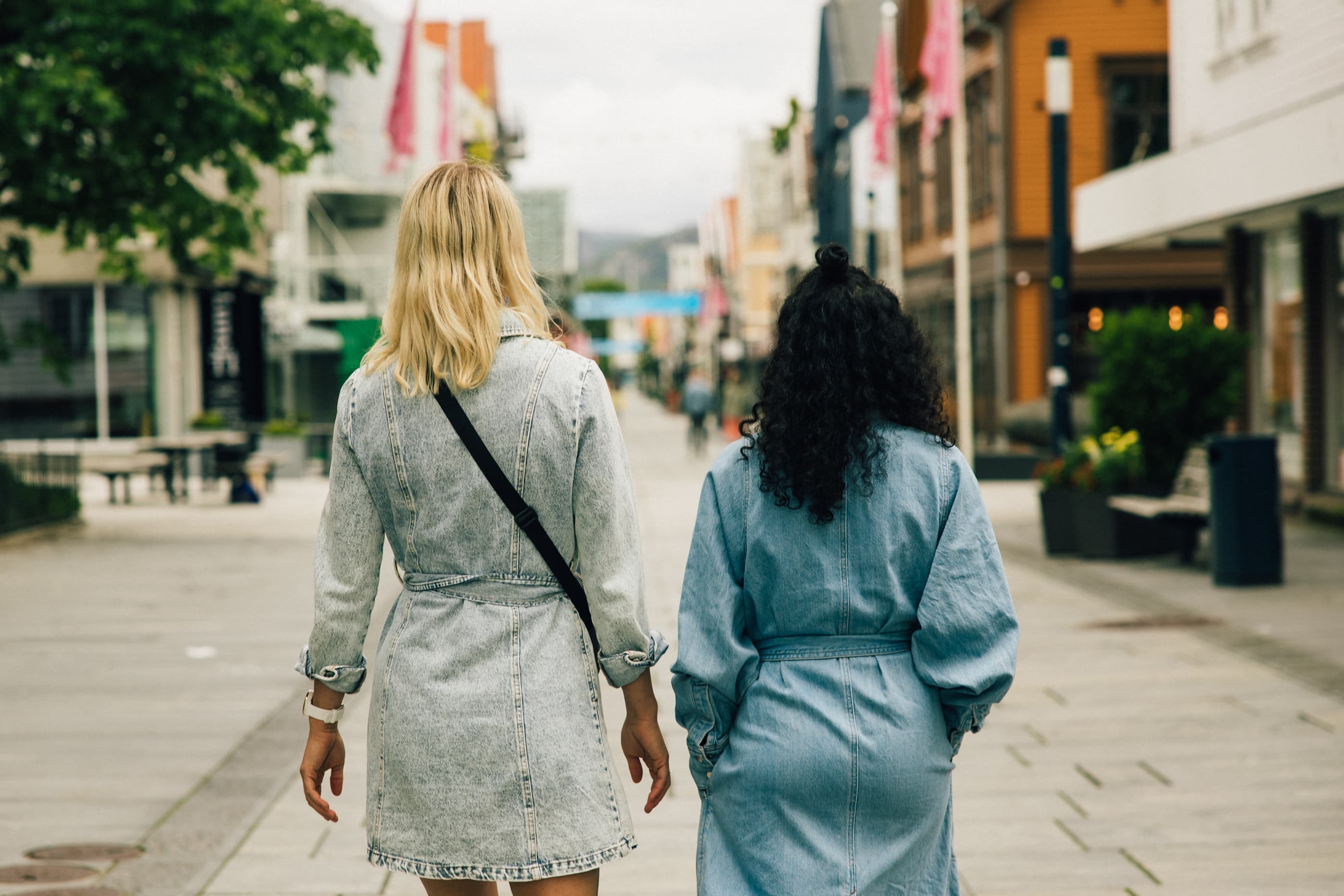 Two women walking in the shopping street in Sandnes, Langgata