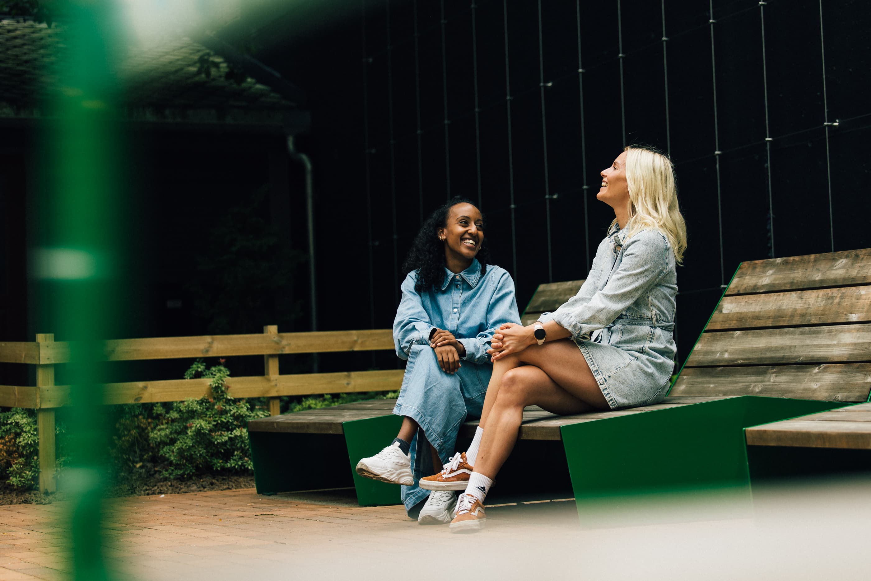 Two women walking in the shopping street in Sandnes, Langgata