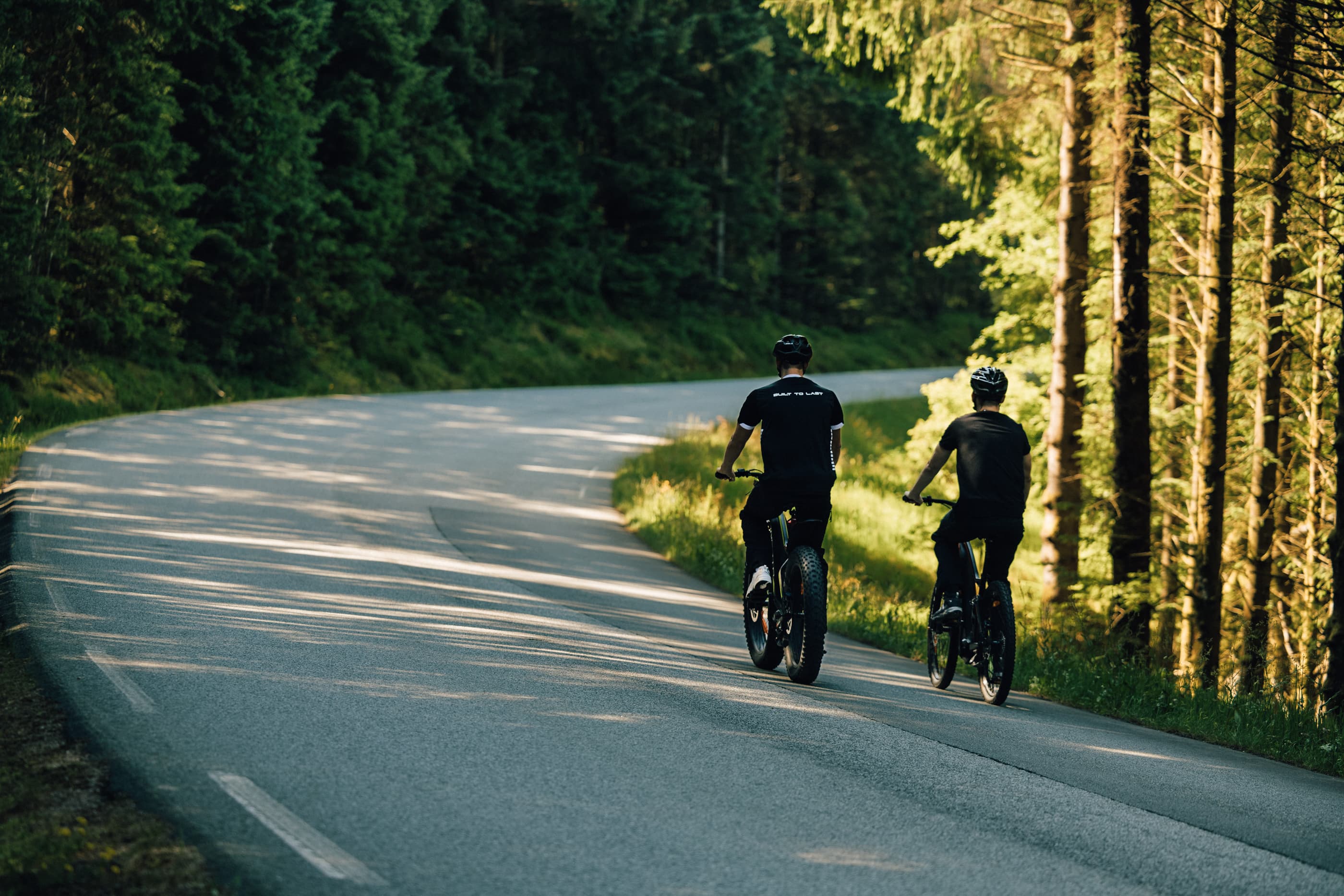 Two men cycling or hiking to mountain uburen in sandnes