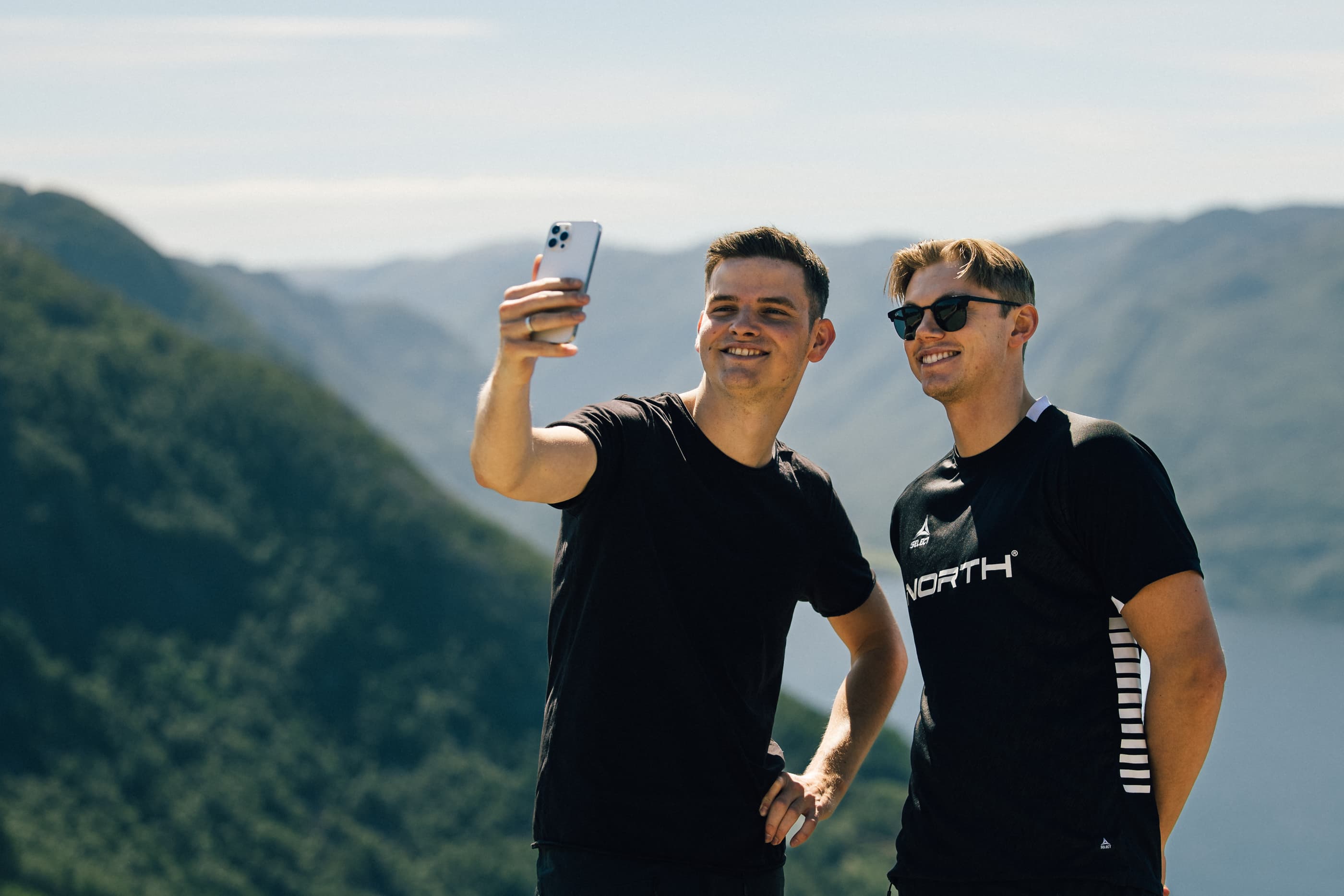 Two men cycling or hiking to mountain uburen in sandnes