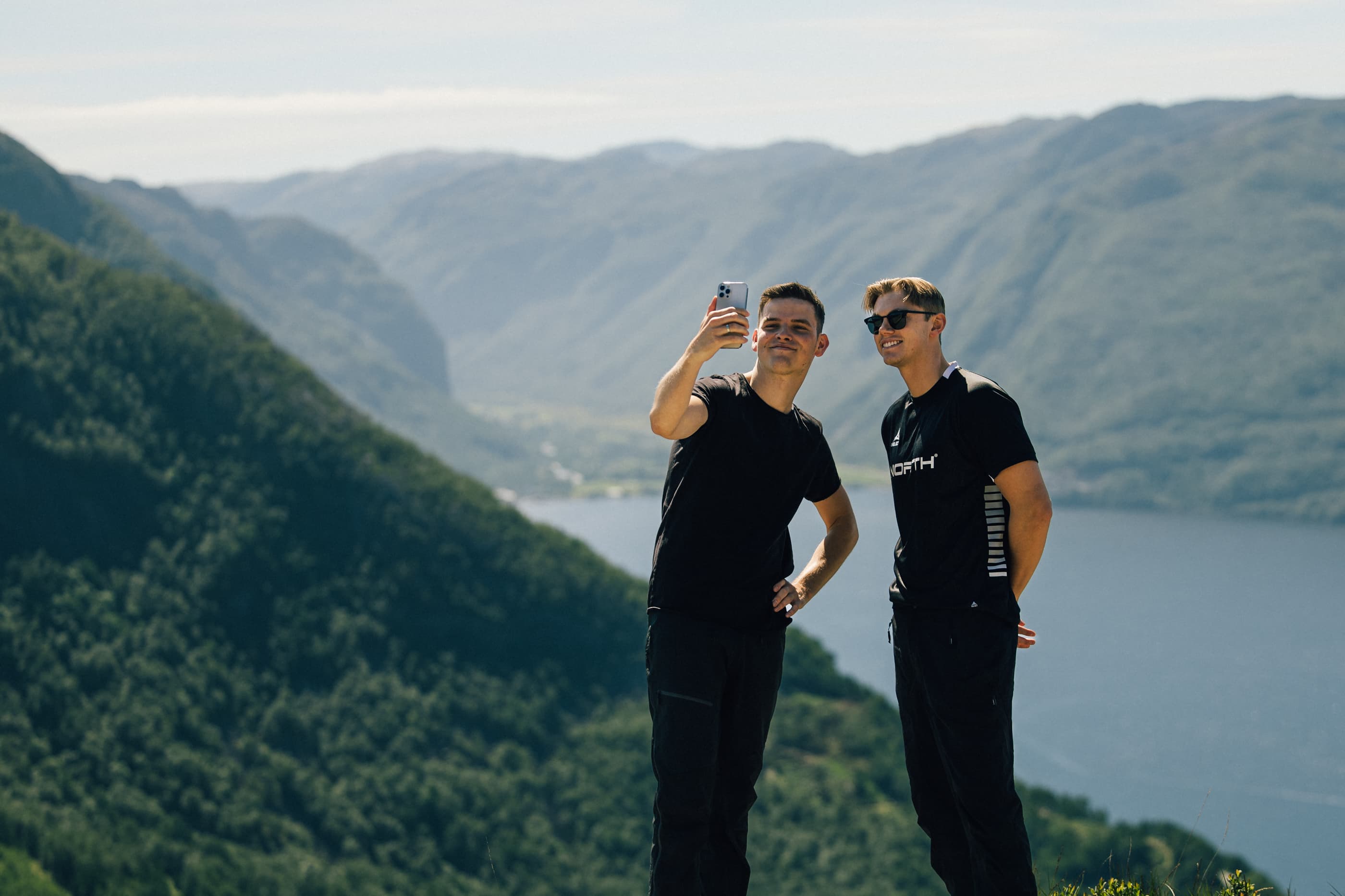 Two men cycling or hiking to mountain uburen in sandnes