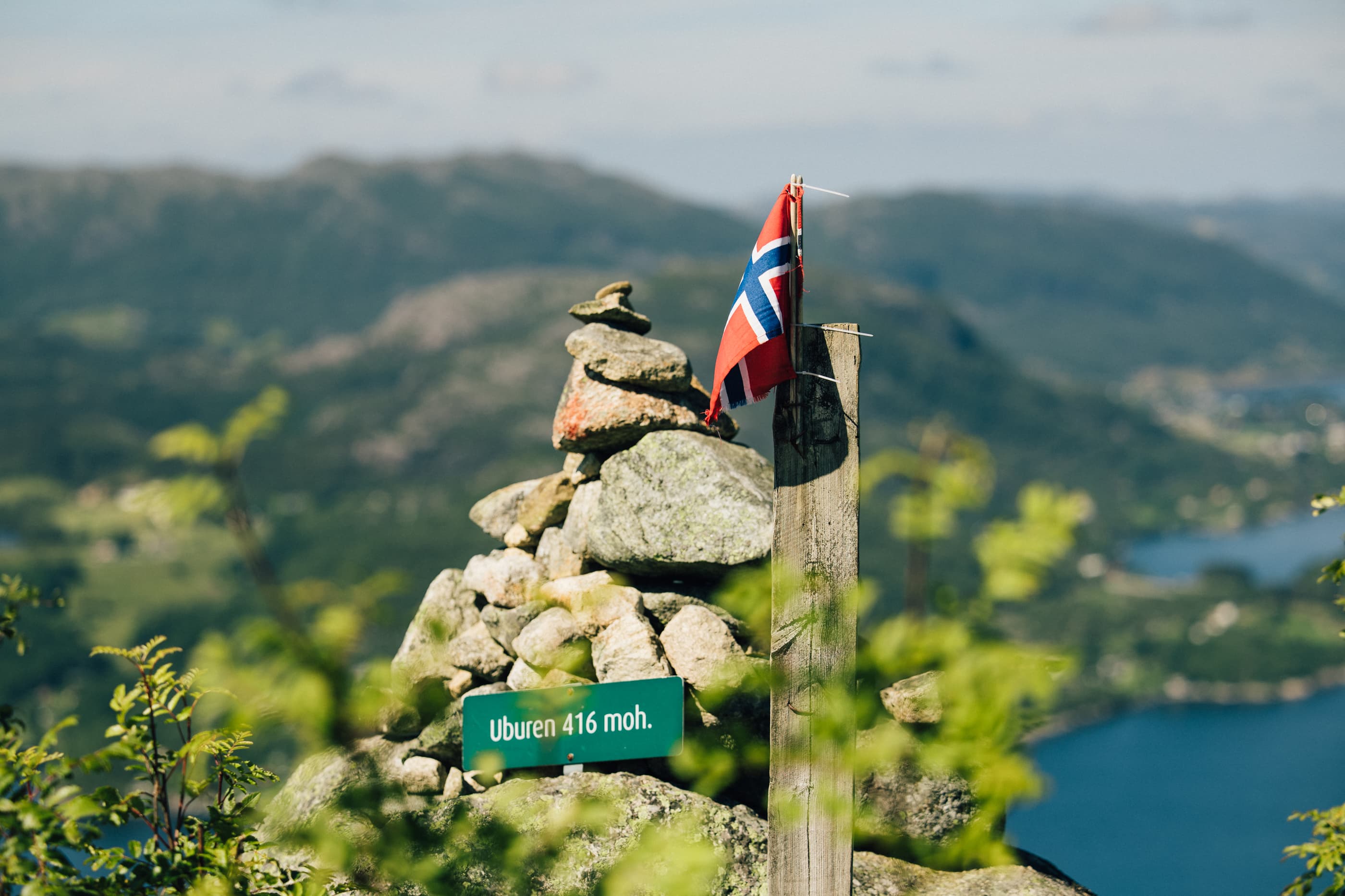 Two men cycling or hiking to mountain uburen in sandnes