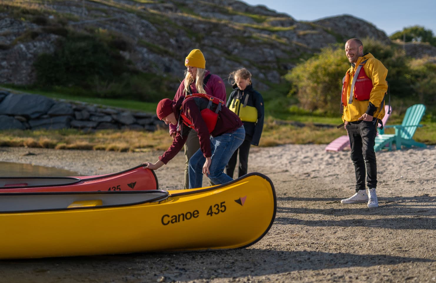 people in kayaks on the water
