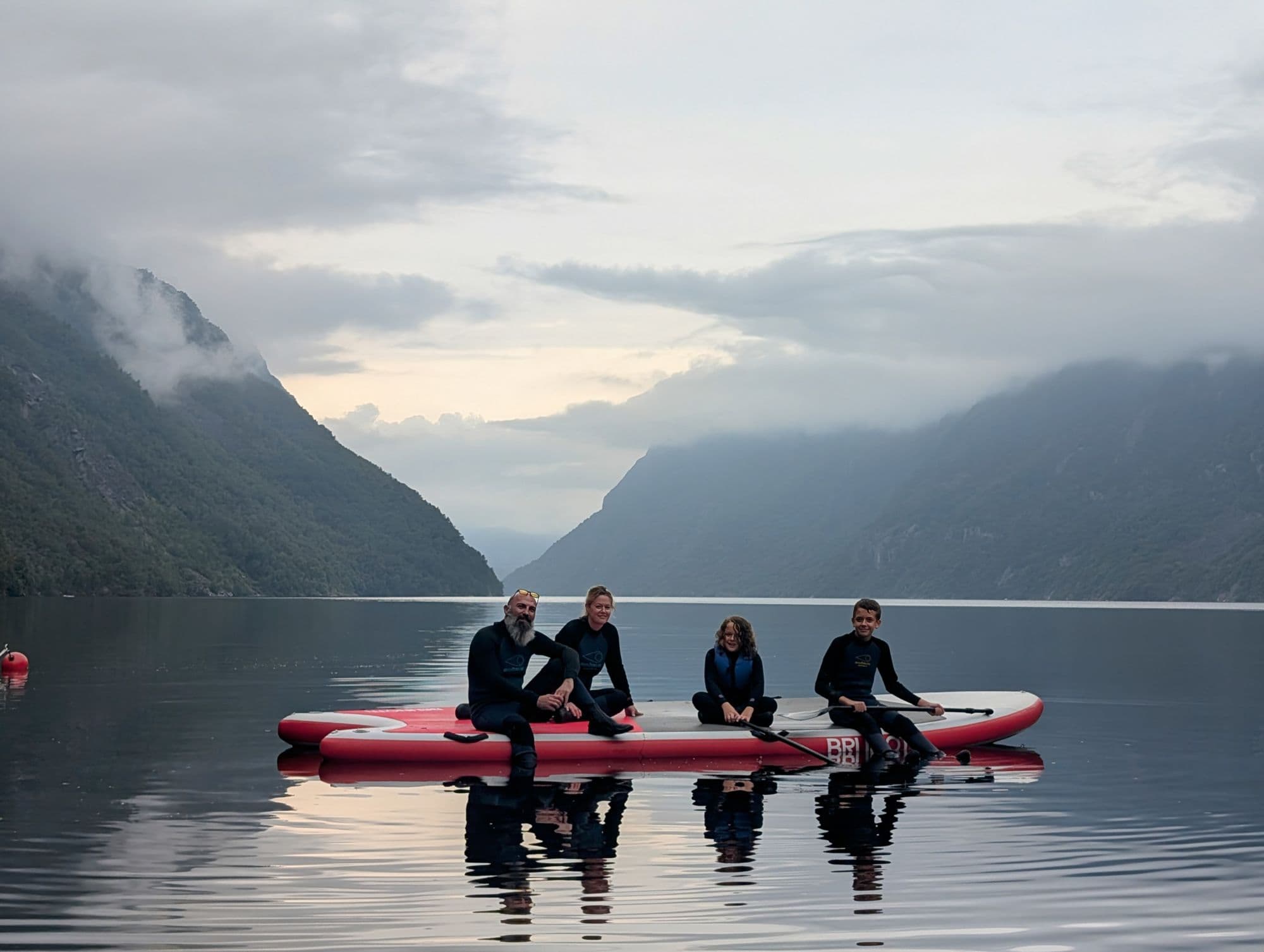 People on SUP or kayak in Frafjord in Dirdal, Gjesdal