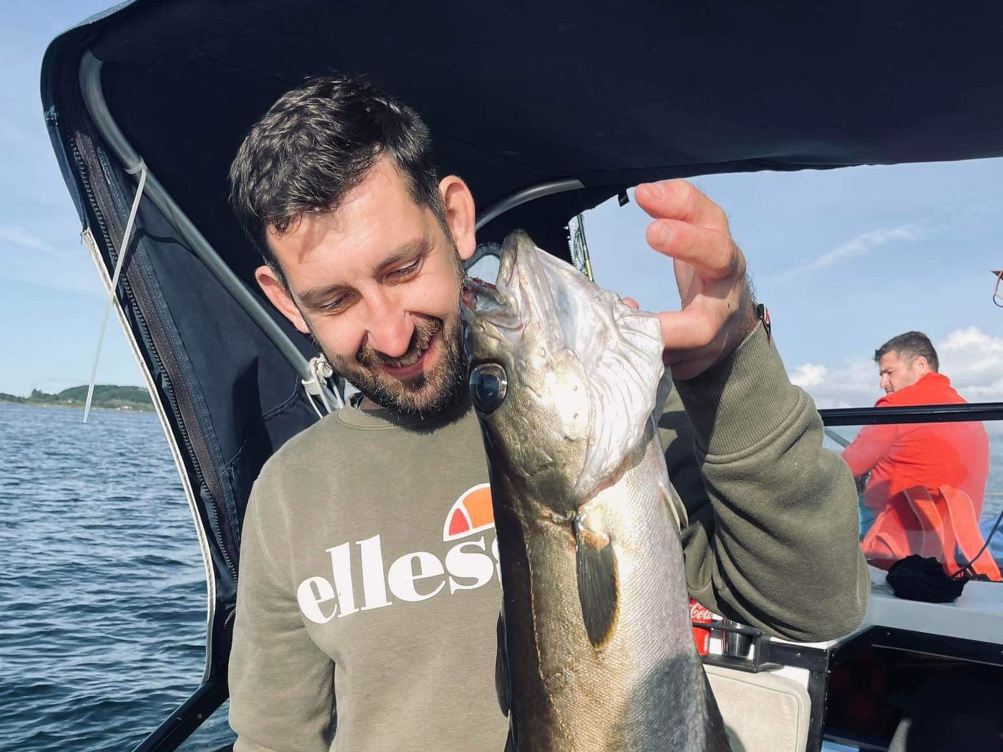 People fishing from a boat
