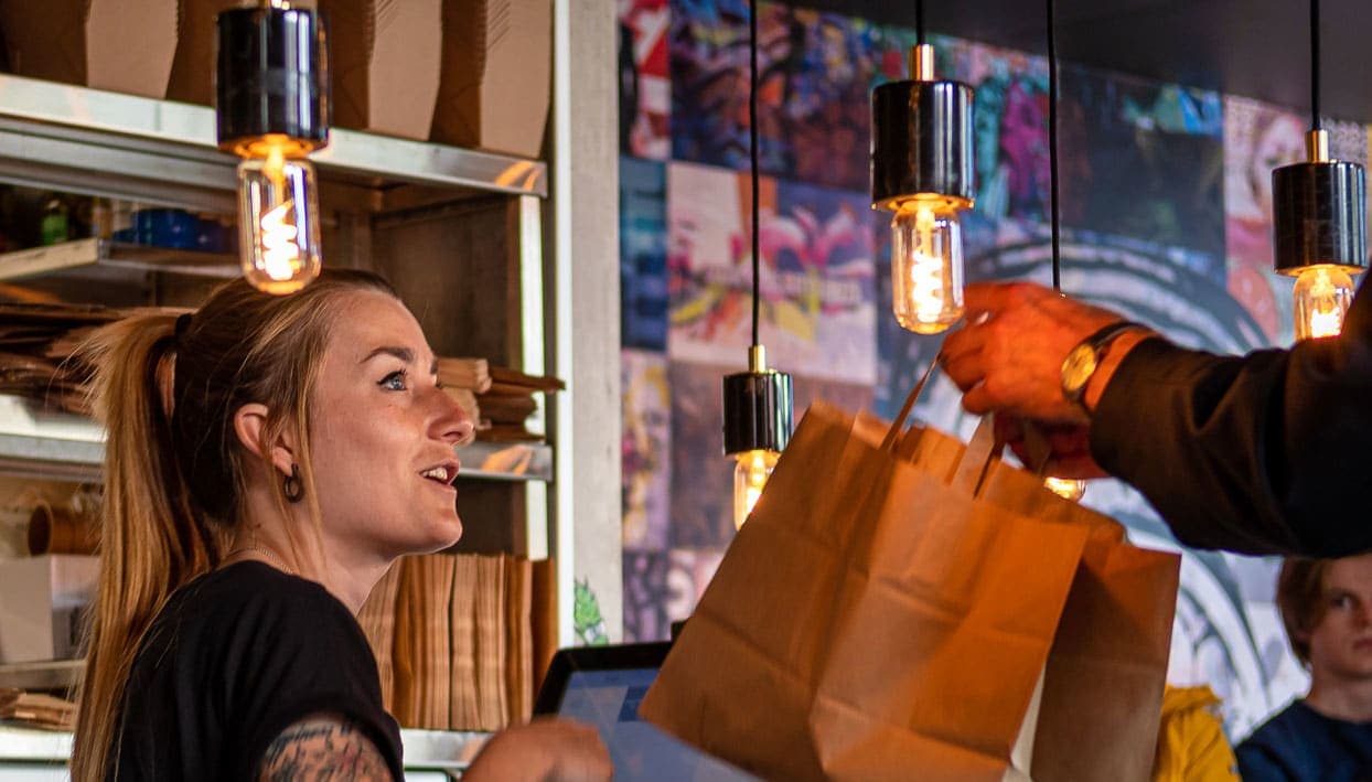 Restaurant, burger, people being served at the burger restaurant