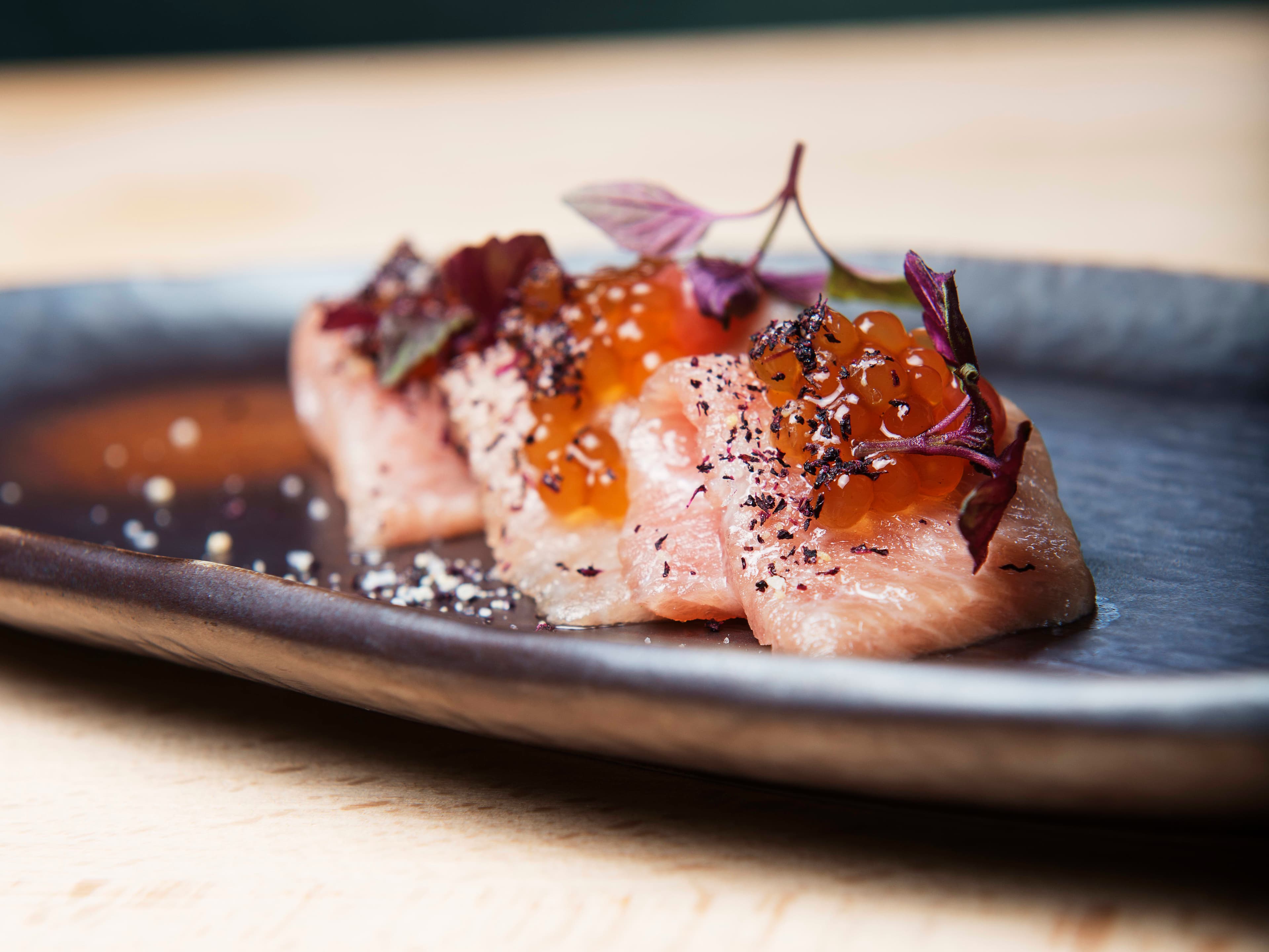 Food and people eating at restaurant Sabi Omakase - Michelin restaurant, Stavanger