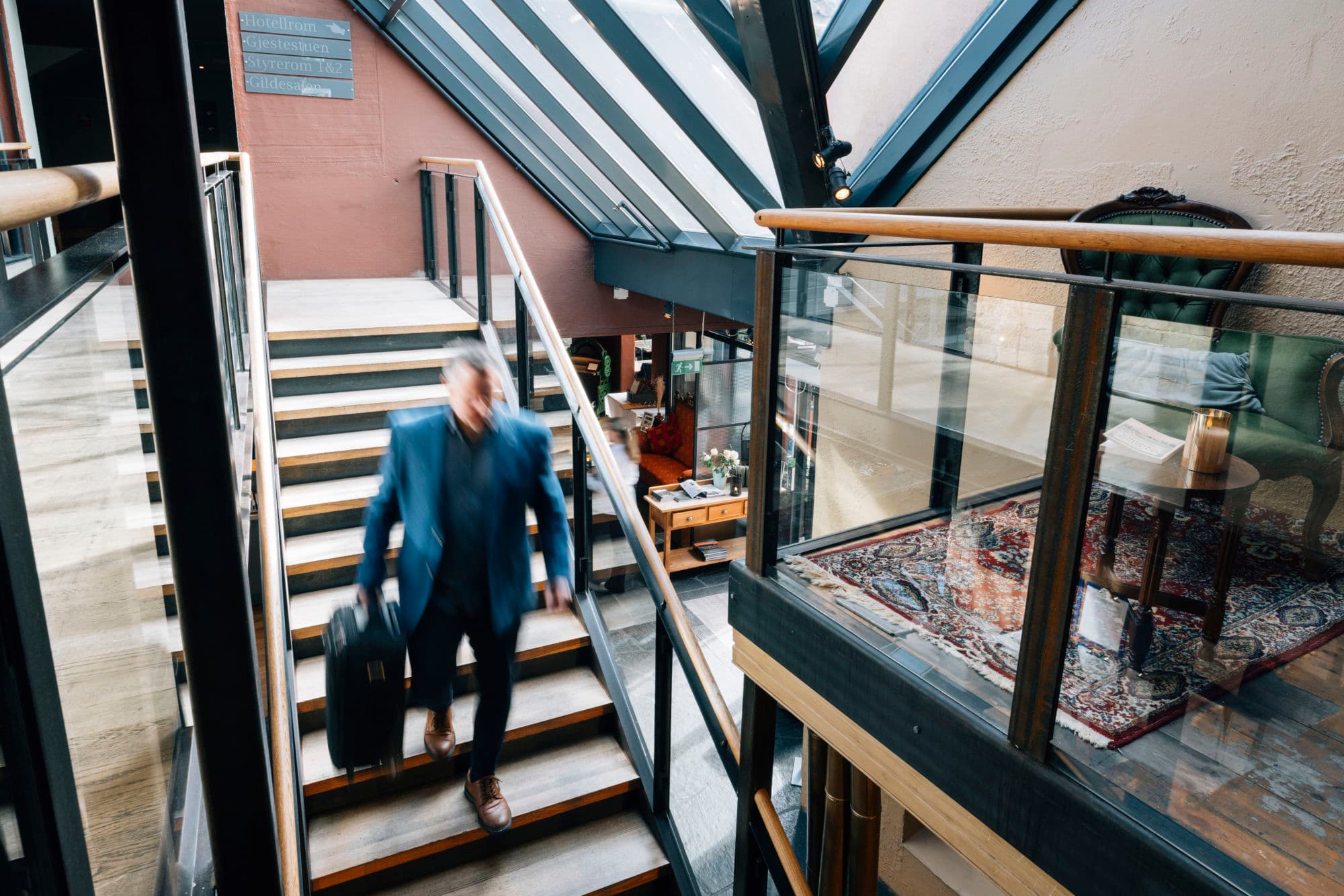 hotel interior with people eating and using hotel facilites. historic hotel