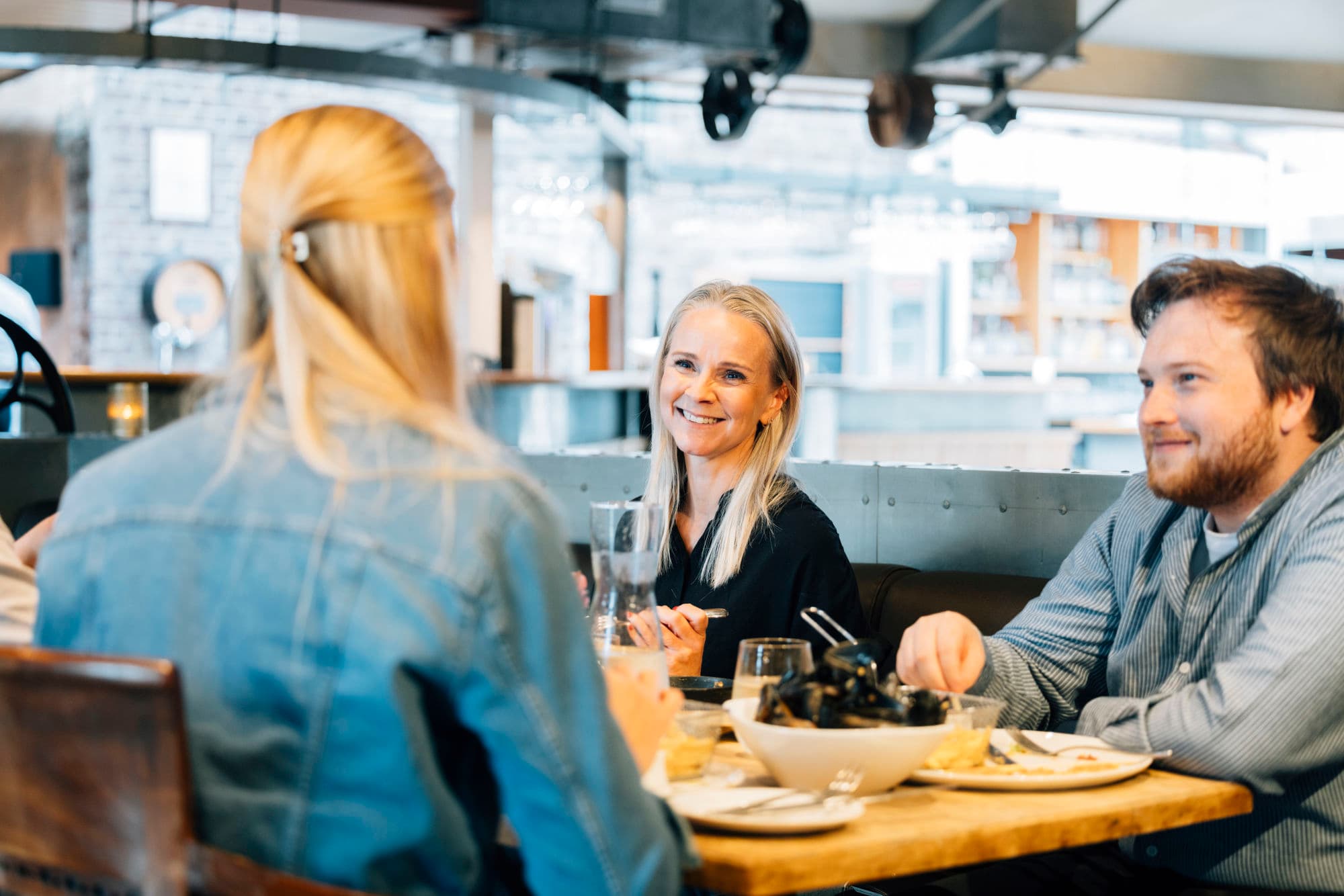 hotel interior with people eating and using hotel facilites. historic hotel