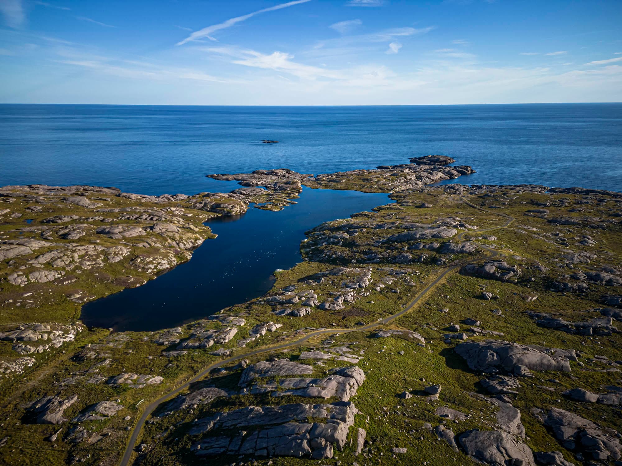 ytstebrød seen from above, ocean and shores with greenery and rocks
