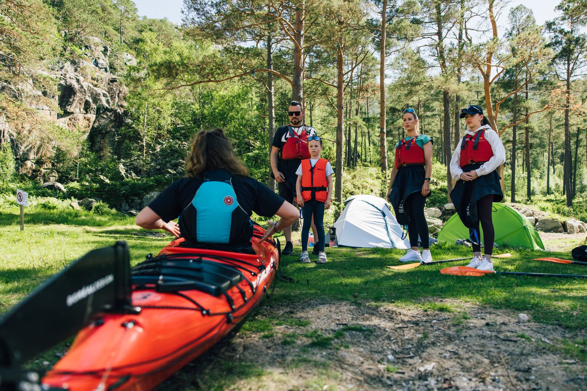 People kayaking in the Norwegian fjords