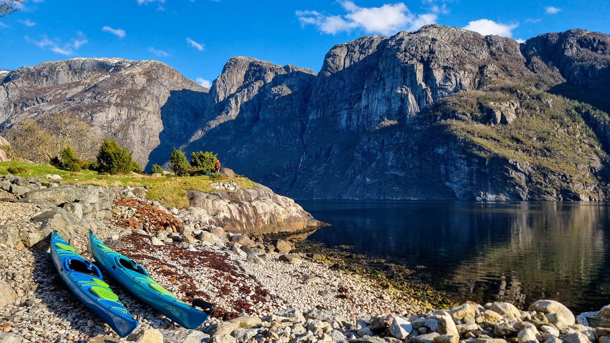 People kayaking in the Norwegian fjords