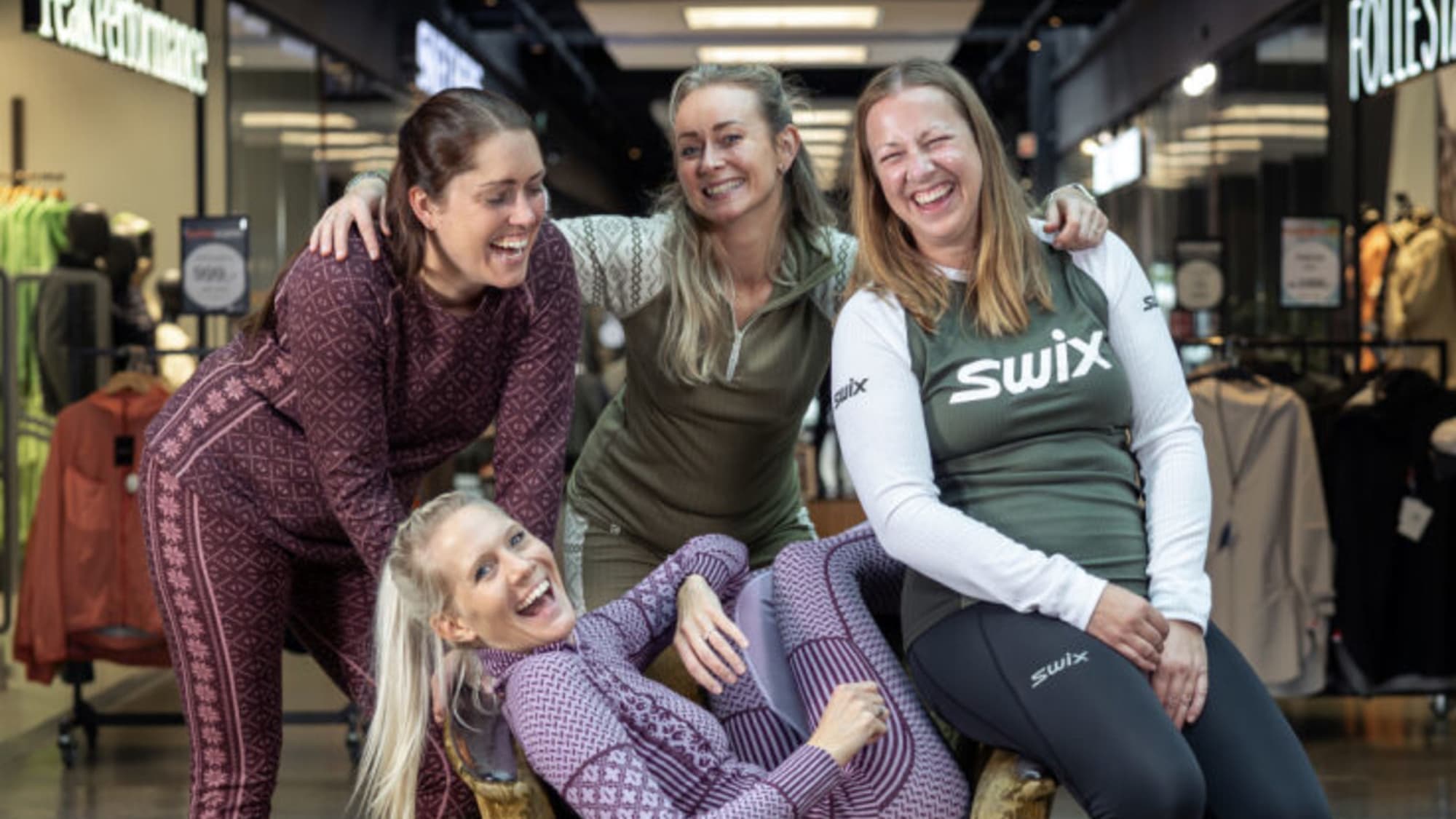 People shopping or in clothing from brandshops at Norwegian Outlet