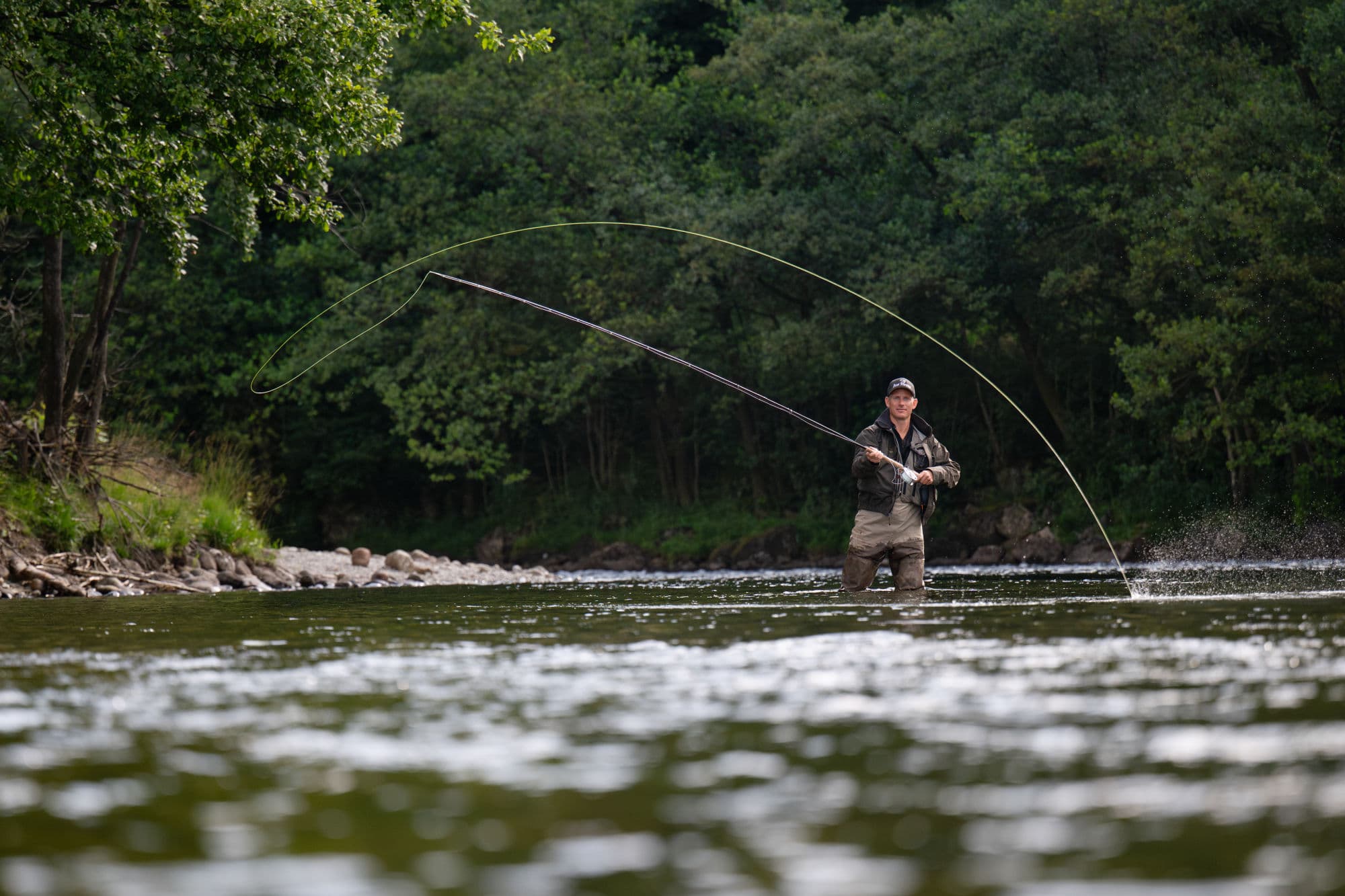 man fishing in the river bjerkreimselva
