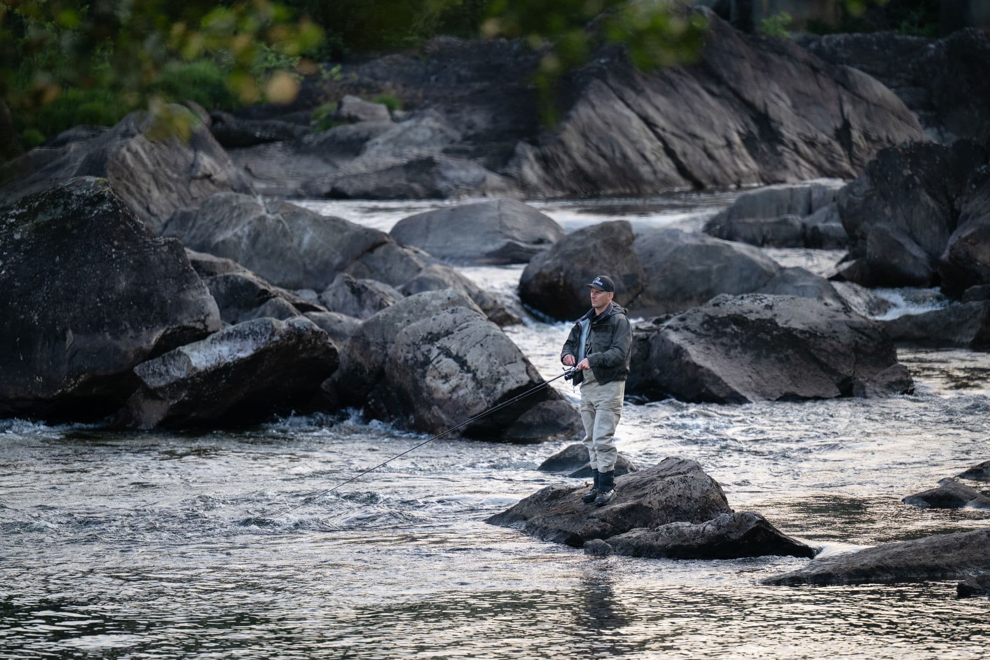 man fishing in the river bjerkreimselva